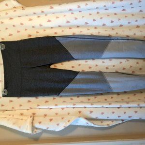 Dark, lighter, light grey leggings